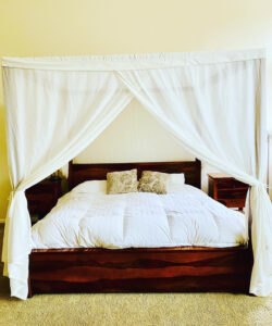 Swiss Shield bed canopy over a bed